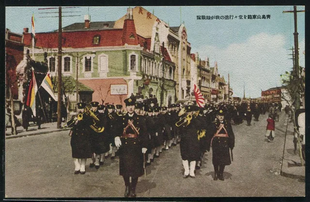 Japanese troops marching along Shandong Road past the corner building.
